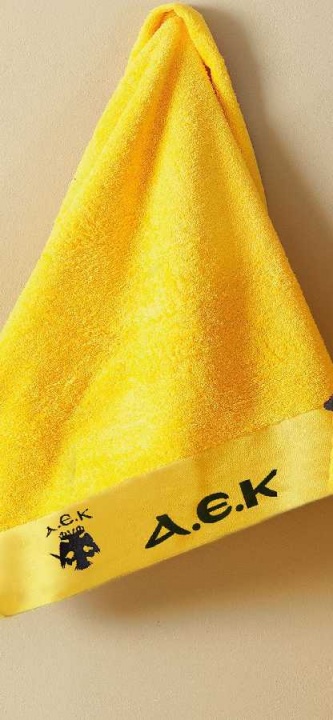 Πετσέτα Προσώπου ΑΕΚ Towels - Palamaiki. Κιίτρινο - Μαύρο, 100% Από Βαμβάκι, 50 x 100 Εκατοστά. Official Team Licenced.