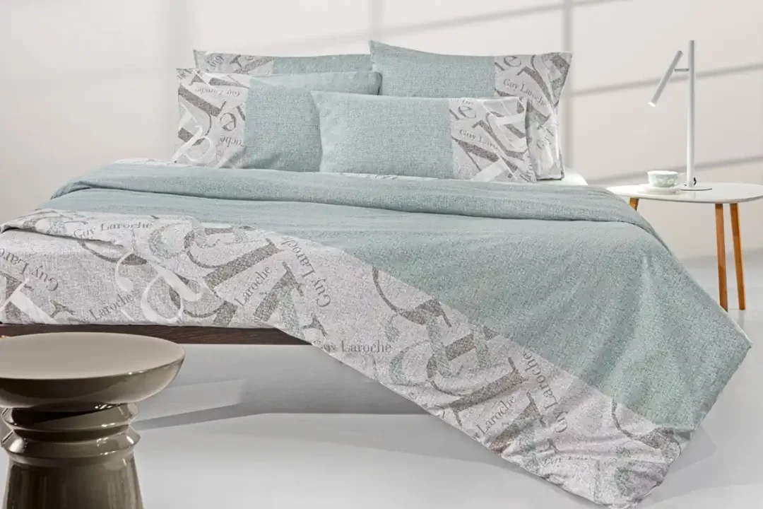 Σεντόνια King Size Guy Laroche Passport Mint. Σετ τεσσάρων τεμαχίων, κατασκευασμένο από 100% βαμβάκι, με μοντέρνο σχεδιασμό, στο πράσινο χρώμα της μέντας.